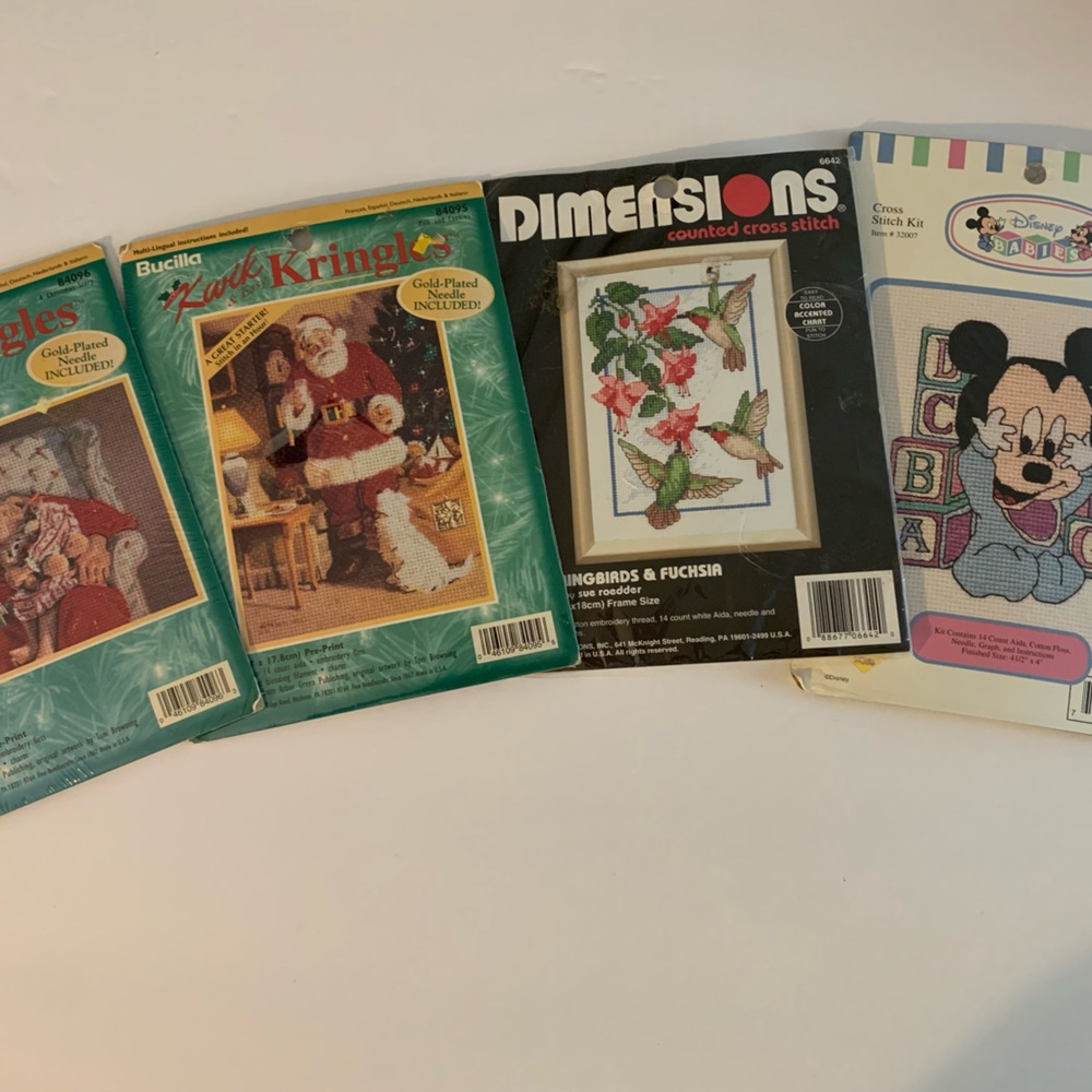 Cross stitch lot. Santa’s hummingbird, and Mickey Mouse. All in unused ,